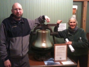 Kathleen & Lester with the old Santa Fe RR bell that was donated (photo by Chrissy Blaylock)